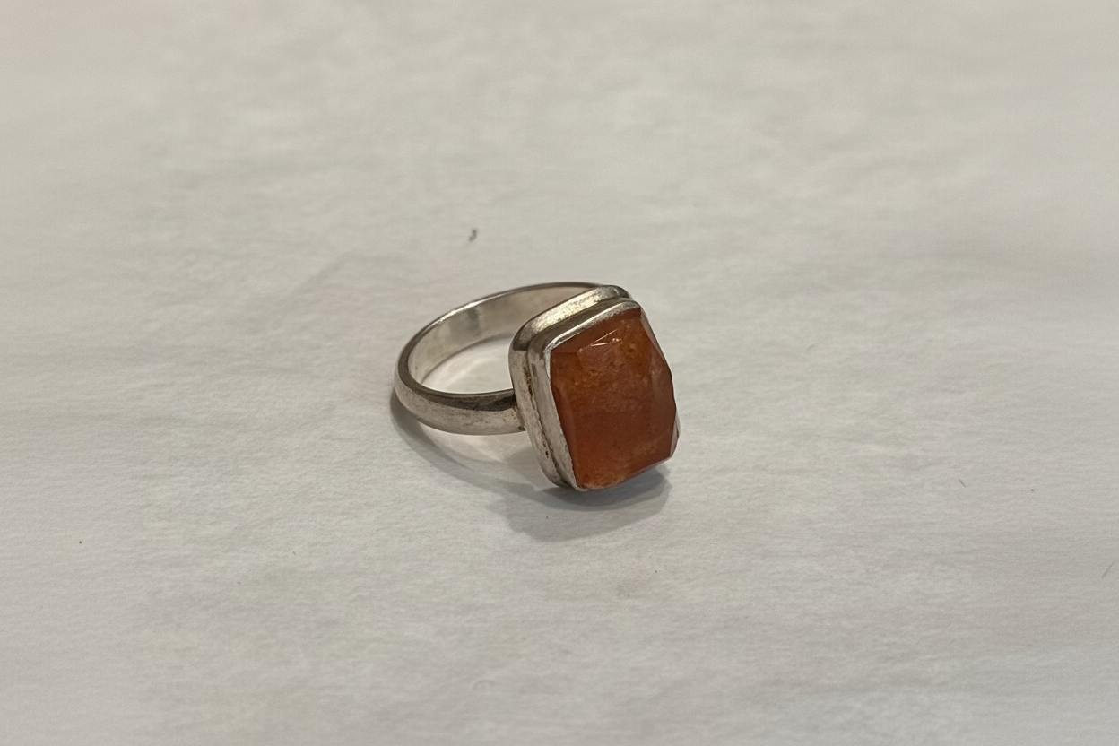 Sunstone Sterling Silver Ring size 5 – radiant orange crystal jewelry symbolizing vitality, energy, and joy.