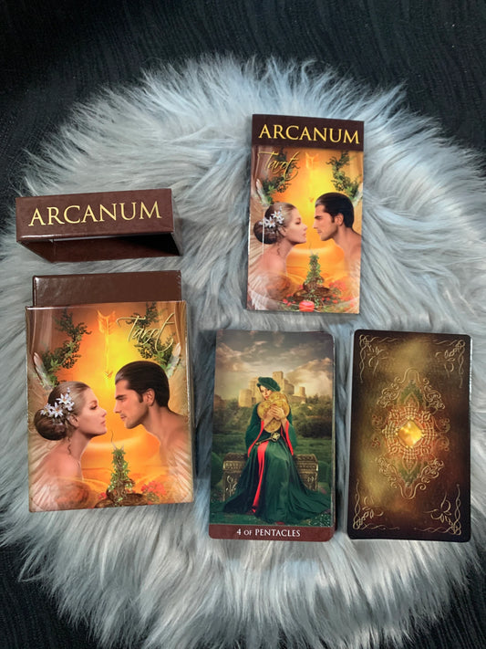 Arcanum Tarot by Renata Lechner – a 78-card deck featuring lush, mystical landscapes and lifelike figures for intuitive readings.
