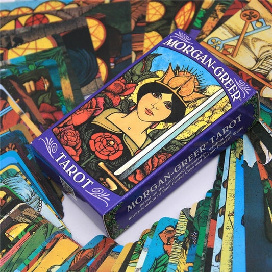 Morgan-Greer Tarot in a Tin by Bill F. Greer & Lloyd Morgan – 78-pocket-sized cards featuring rich, saturated colors and borderless illustrations, housed in a compact tin box with a 78-page guidebook.
