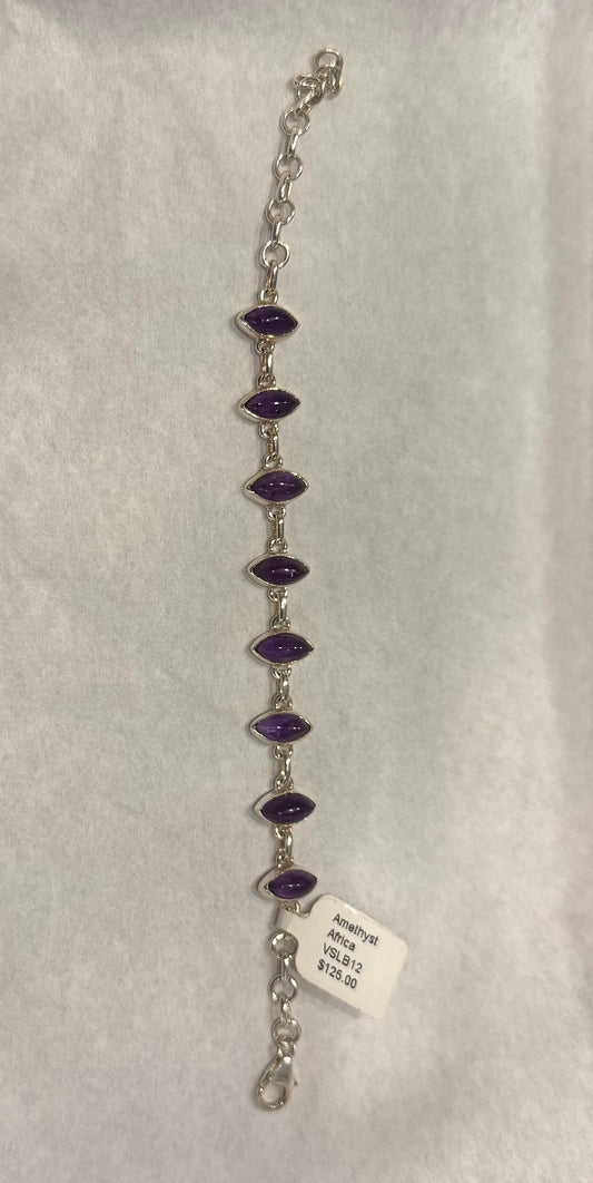 Amethyst Africa Sterling Silver Bracelet – stunning purple crystal jewelry known for spiritual protection and calming energy.

