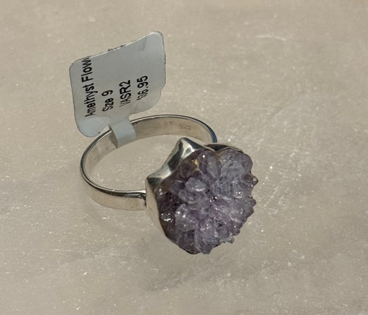 Amethyst Flower Sterling Silver Ring size 9 – delicate purple crystal jewelry with floral design symbolizing peace and spiritual growth.

