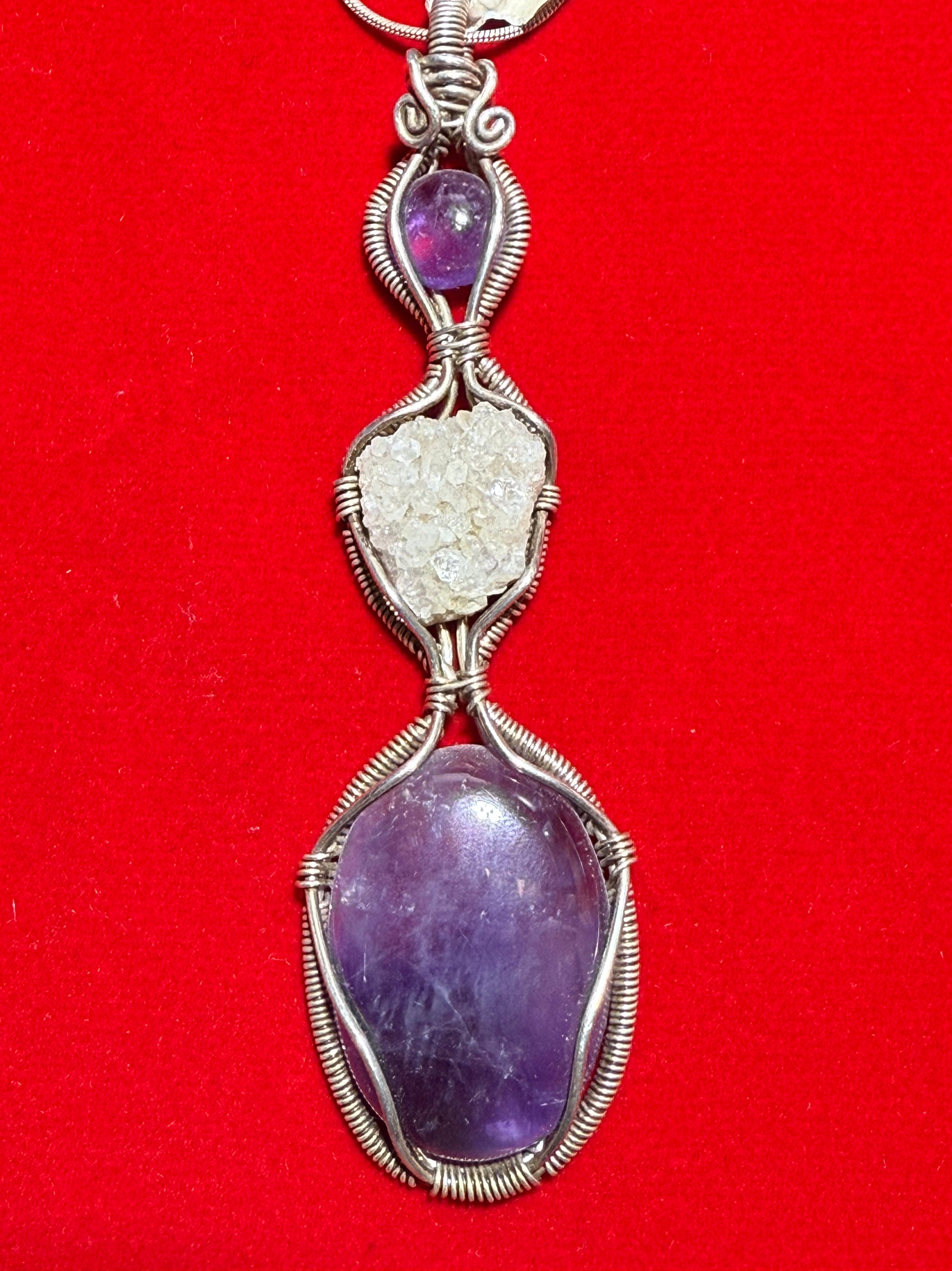 Amethyst Sterling Silver Pendant – vibrant purple crystal jewelry known for spiritual insight, healing, and calming energy.
