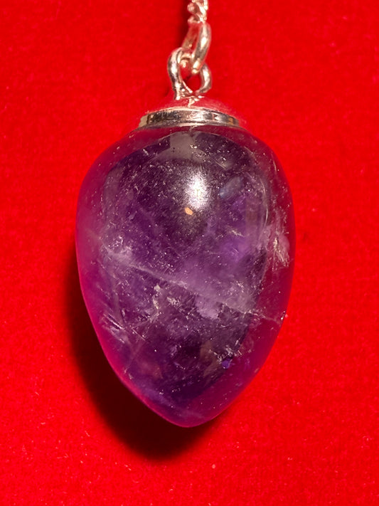 Amethyst Sterling Silver Pendulum – spiritual divination tool featuring vibrant purple amethyst crystal for healing and intuition.
