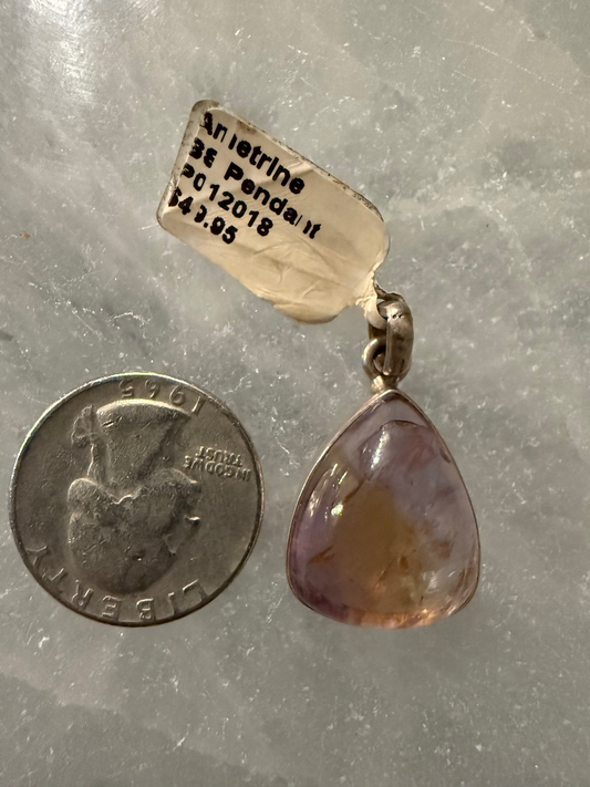 Ametrine Drop Crystal Sterling Silver Pendant – stunning blend of amethyst and citrine crystals for balance and clarity.