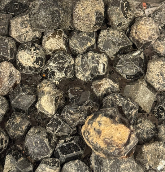 Andradite Garnet Tumbled – polished andradite garnet stones known for strength and vitality.
