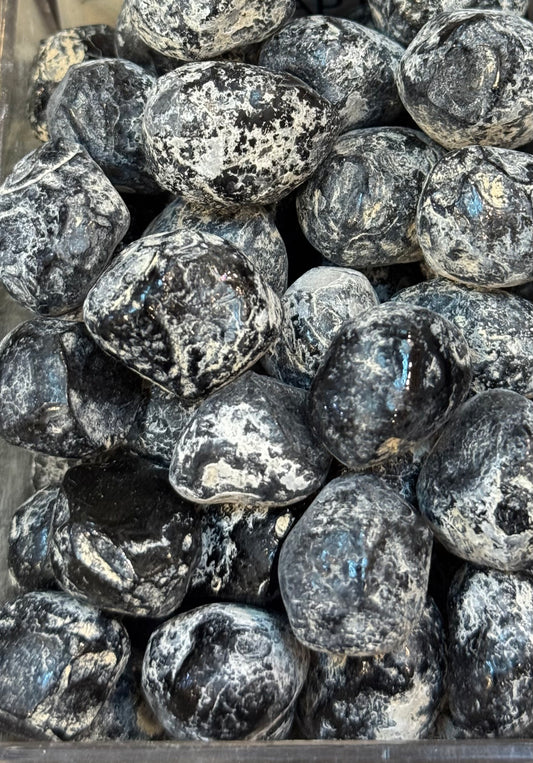 Apache Tear Crystal Raw – natural raw black obsidian stones known as Apache Tears, perfect for protection and grounding.
