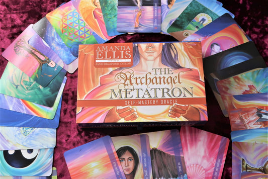 The Archangel Metatron Self-Mastery Oracle by Amanda Ellis & Jane Delaford Taylor – 55-card deck and guidebook featuring vibrant artwork and channeled messages for spiritual growth and self-mastery.
