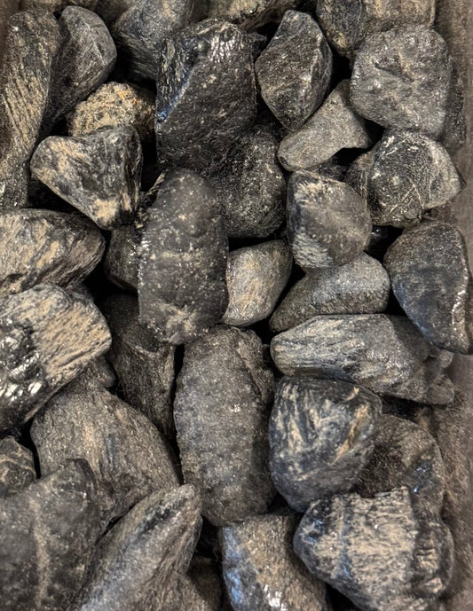 Black Spinel Tumbled Crystal – polished black spinel stones known for protection and strength.
