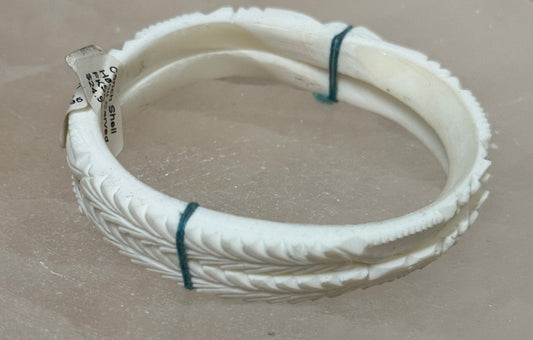 Conch Shell Hand Carved Bangle – unique natural shell bangle with detailed hand-carving, perfect for beach-inspired style.
