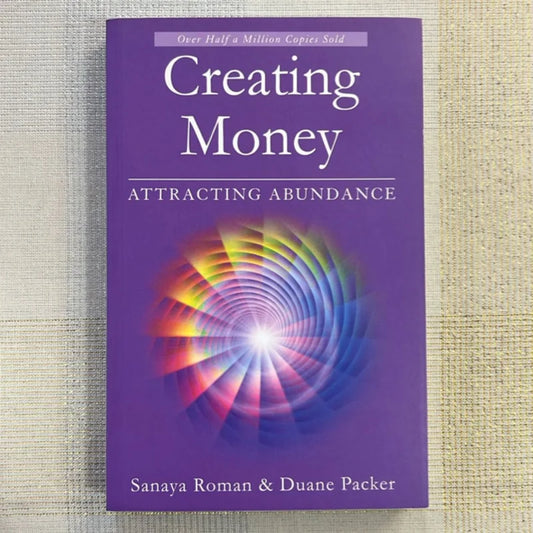 Creating Money by Sanaya Roman & Duane Packer – spiritual and practical tools to attract prosperity and financial flow.
