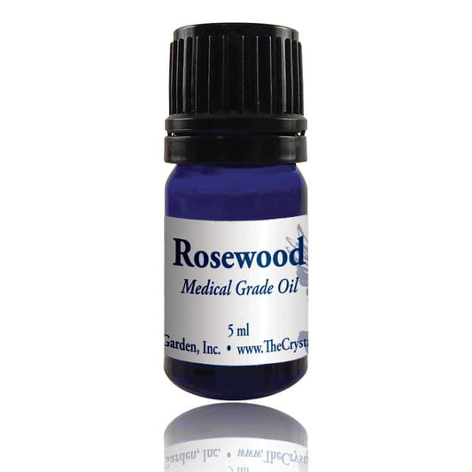Crystal Garden Rosewood Medical Grade Oil – grounding essential oil for balance, comfort, and emotional well-being.
