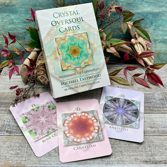 Crystal Oversoul Attunements by Michael Eastwood – 44 full-color crystal mandala cards and a 112-page guidebook for meditation and healing, featuring insights into crystal consciousness and attunements.
