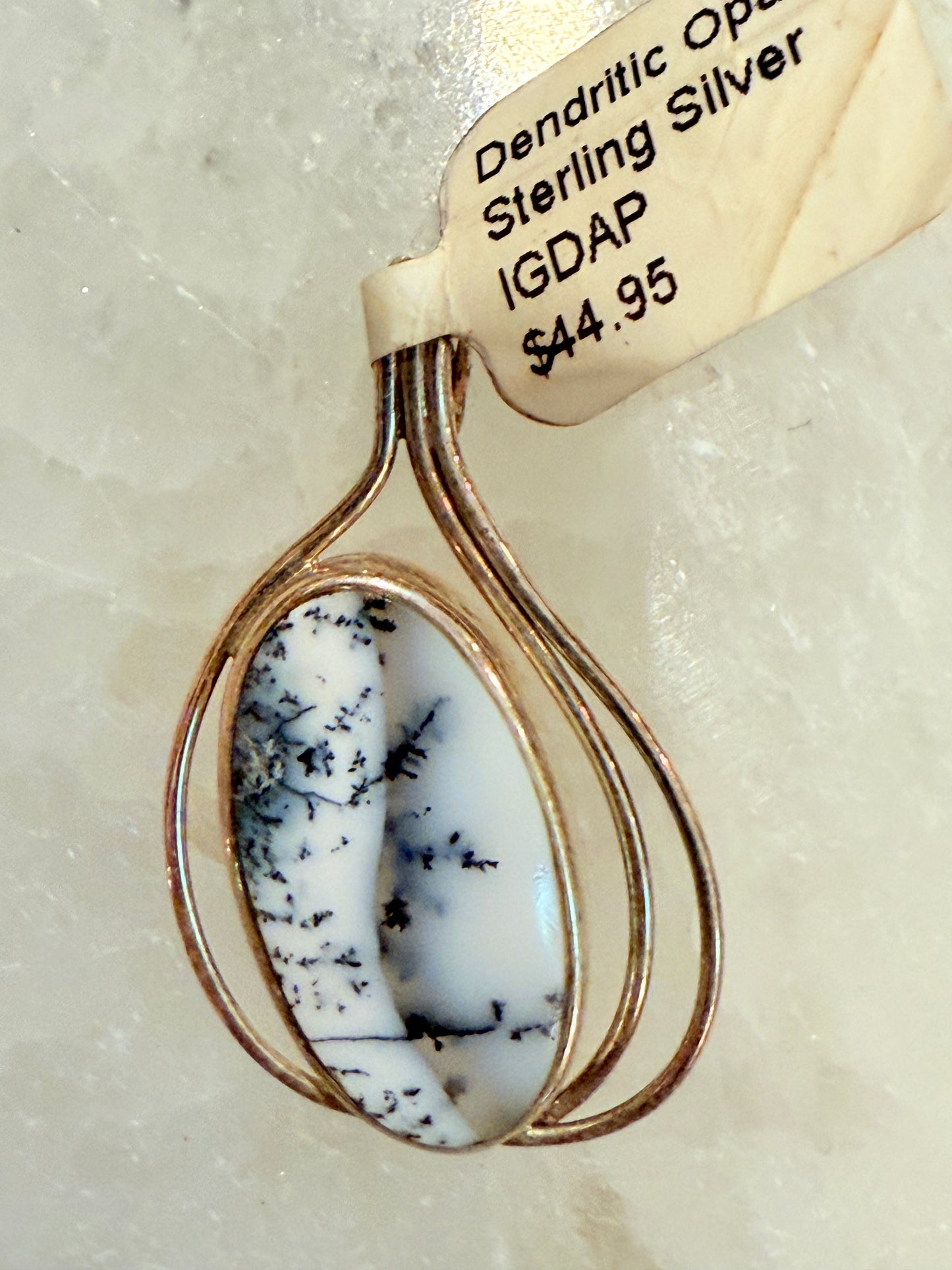 Dendritic Opal Cabochon Sterling Silver Pendant with 3 Wire – unique silver jewelry featuring dendritic opal and artistic wire design symbolizing growth and creativity.
