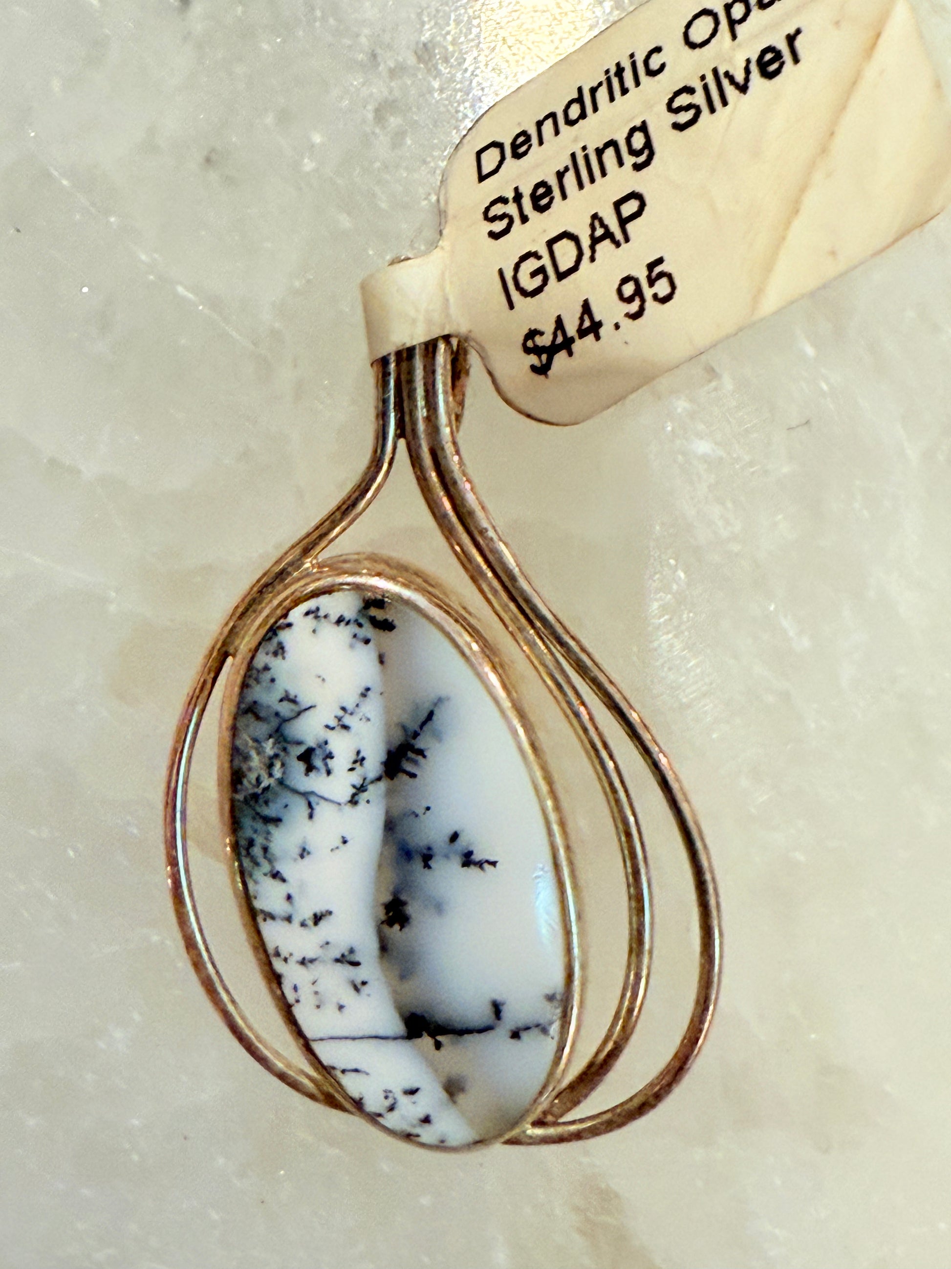 Dendritic Opal Cabochon Sterling Silver Pendant with 3 Wire – unique silver jewelry featuring dendritic opal and artistic wire design symbolizing growth and creativity.
