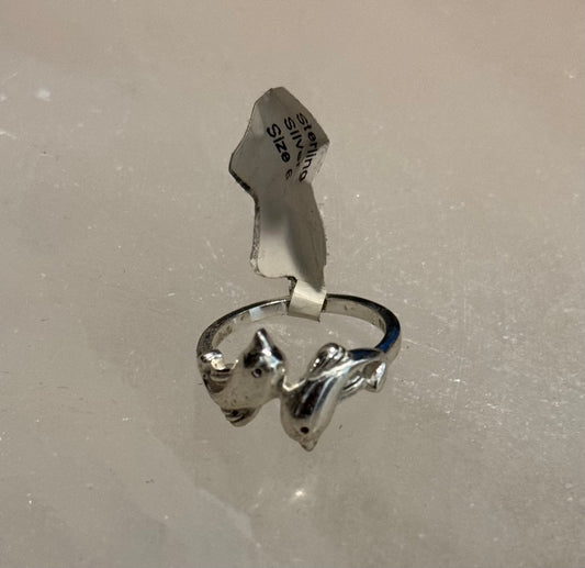 Double Dolphin Sterling Silver Ring size 6 – graceful silver jewelry featuring two dolphins symbolizing harmony, intelligence, and playfulness.
