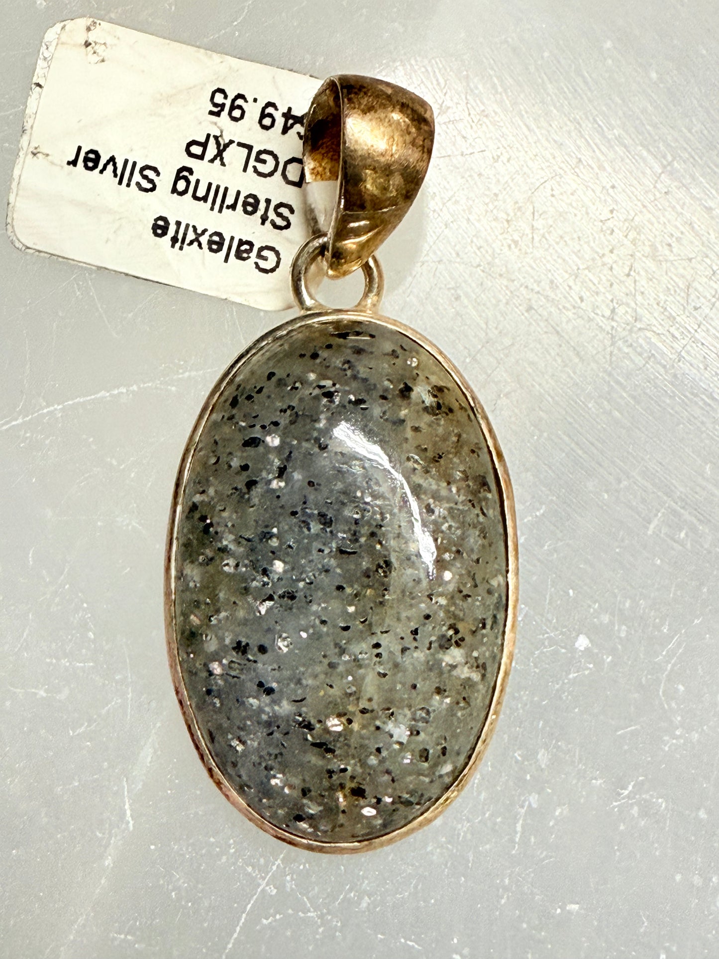 Galexite Oval Shaped Sterling Silver Pendant – unique silver jewelry featuring oval galexite stone known for clarity and spiritual energy.
