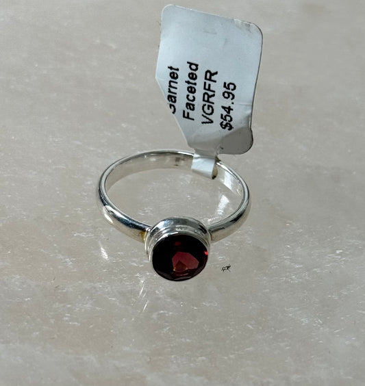 Garnet Faceted Circle Shaped Sterling Silver Ring Size 7 – elegant faceted circular garnet set in sterling silver, perfect for refined and stylish jewelry.
