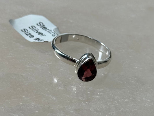 Garnet Faceted Triangle Shaped Sterling Silver Ring Size 8 – elegant faceted triangle garnet set in sterling silver, perfect for unique jewelry lovers.
