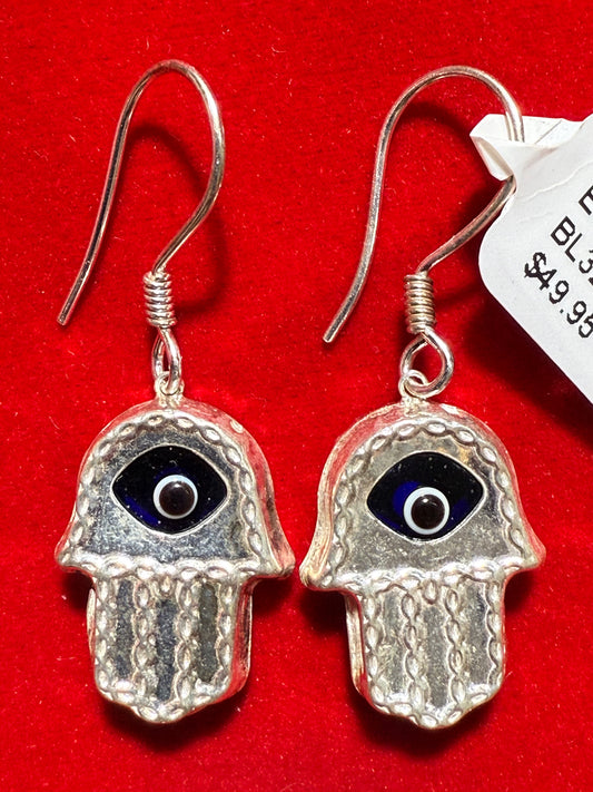 Hamsa Hand Evil Eye Earrings – protective silver earrings featuring Hamsa hand and evil eye symbols for luck and spiritual defense.
