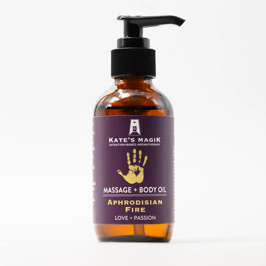 Kate's Magik Aphrodisian Fire Massage + Body Oil – sensual blend for passion, intimacy, and igniting inner fire.
