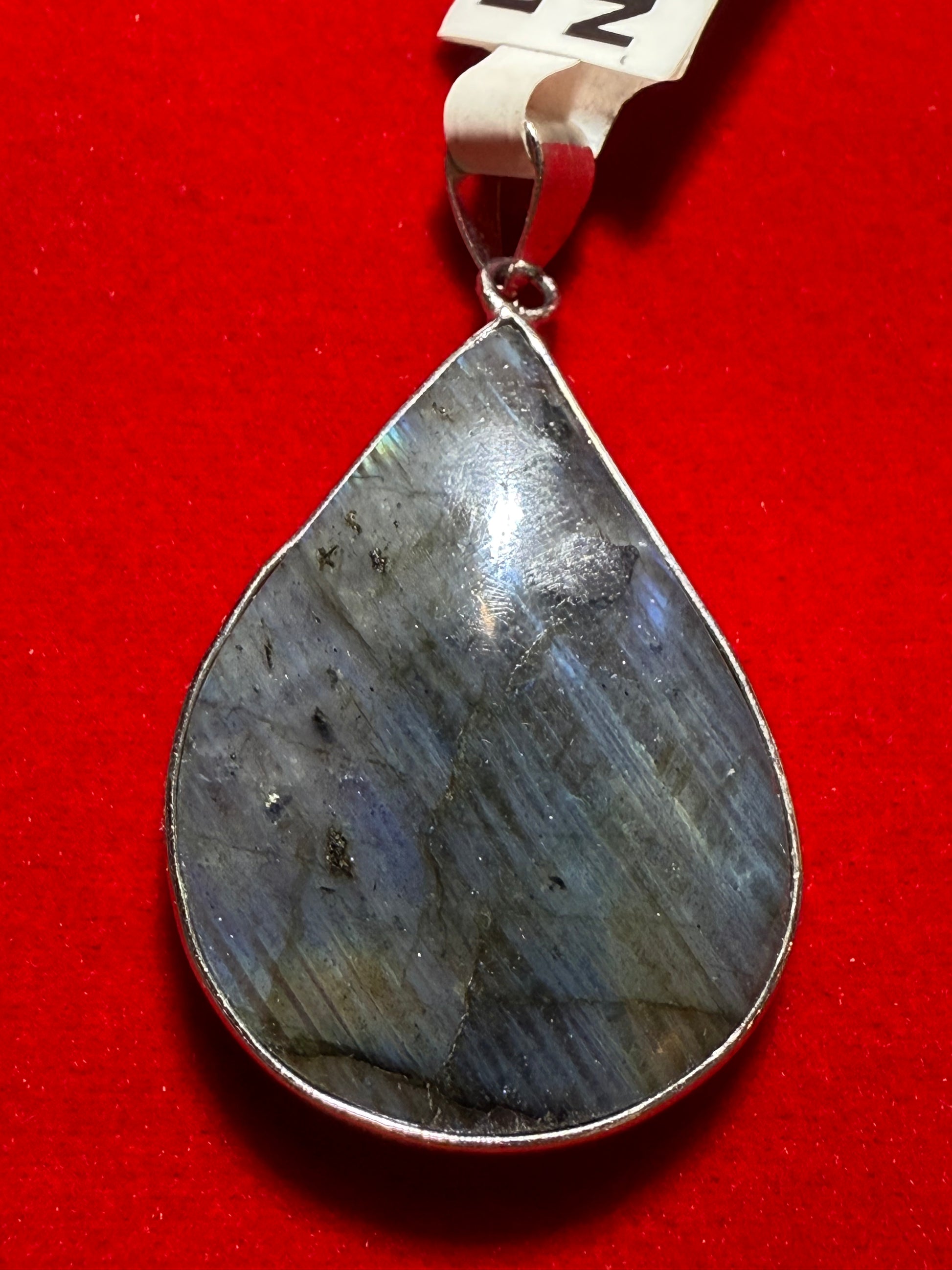 Labradorite Pendant – mystical crystal jewelry featuring iridescent labradorite known for protection and transformation.
