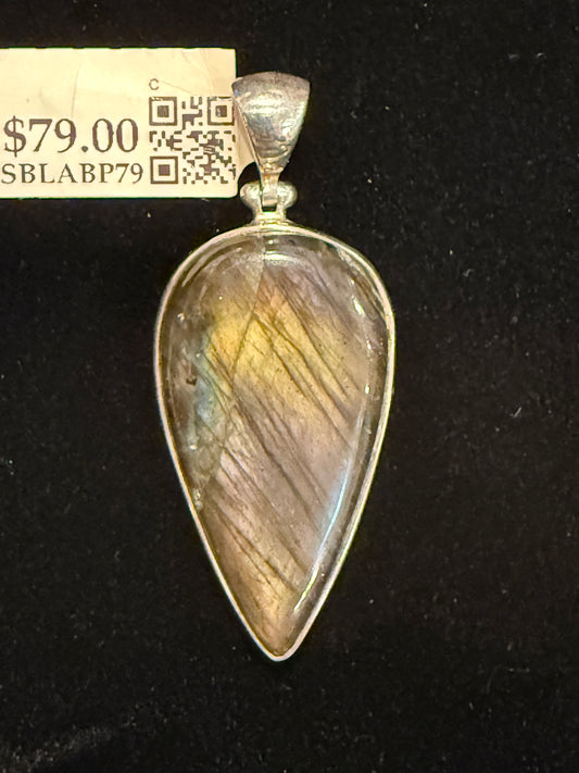 Labradorite Sterling Silver Pendant – mystical silver jewelry featuring iridescent labradorite stone known for protection and transformation.
