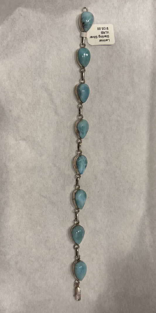 Larimar Sterling Silver Bracelet – tranquil blue crystal jewelry known for calming energy and emotional balance.
