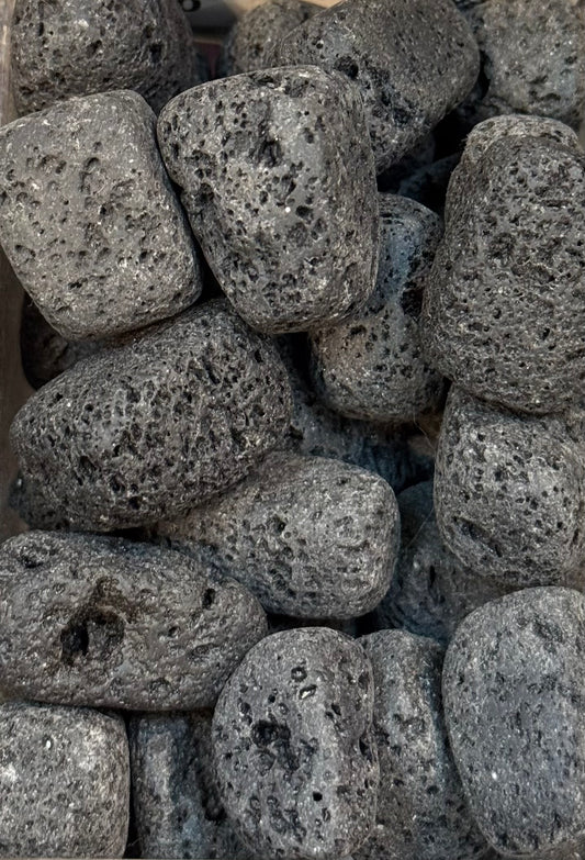 Lavastone Tumbled Crystal – polished volcanic lava stones known for grounding and calming properties.
