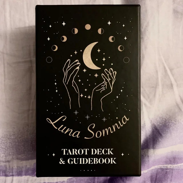 Luna Somnia Tarot Deck by Aniko Gajdocsi – 78-card deck featuring celestial and astrological symbols, combining traditional Rider-Waite-Smith imagery with modern mystical elements, designed to enhance intuition and spiritual insight.
