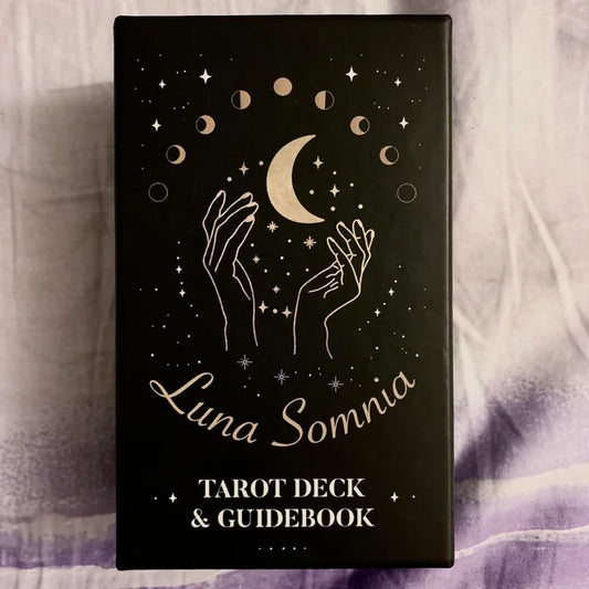 Luna Somnia Tarot Deck by Aniko Gajdocsi – 78-card deck featuring celestial and astrological symbols, combining traditional Rider-Waite-Smith imagery with modern mystical elements, designed to enhance intuition and spiritual insight.
