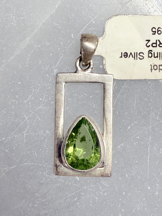 Peridot Sterling Silver Pendant – vibrant green crystal jewelry known for abundance, healing, and positive energy.
