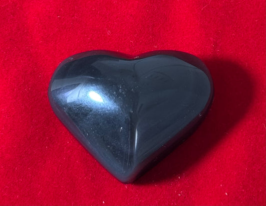 Rainbow Obsidian Crystal Heart Shaped – polished heart-shaped rainbow obsidian known for protective and healing energies.
