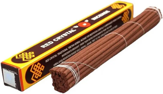 Red Crystal Traditional Tibetan Herbal Incense Sticks alongside red and yellow packaging on white background