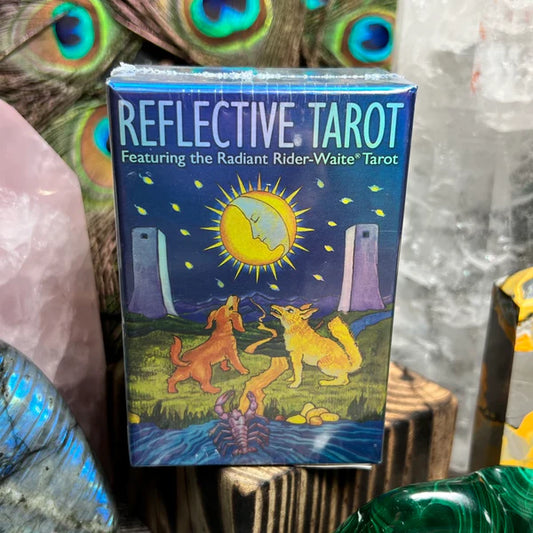 Reflective Tarot Featuring the Radiant Rider-Waite® Tarot – 78-card deck with holographic luminescent finish, enhancing the vibrant colors of the Radiant Rider-Waite® for dynamic readings.
