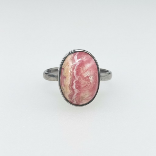 Rhodochrosite Drop/Oval Sterling Silver Ring size 7 – elegant silver jewelry featuring drop-shaped oval rhodochrosite crystal symbolizing love and emotional healing.
