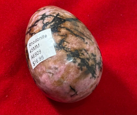 Rhodonite 45MM Crystal – polished rhodonite stone measuring 45mm, known for emotional healing and balance.
