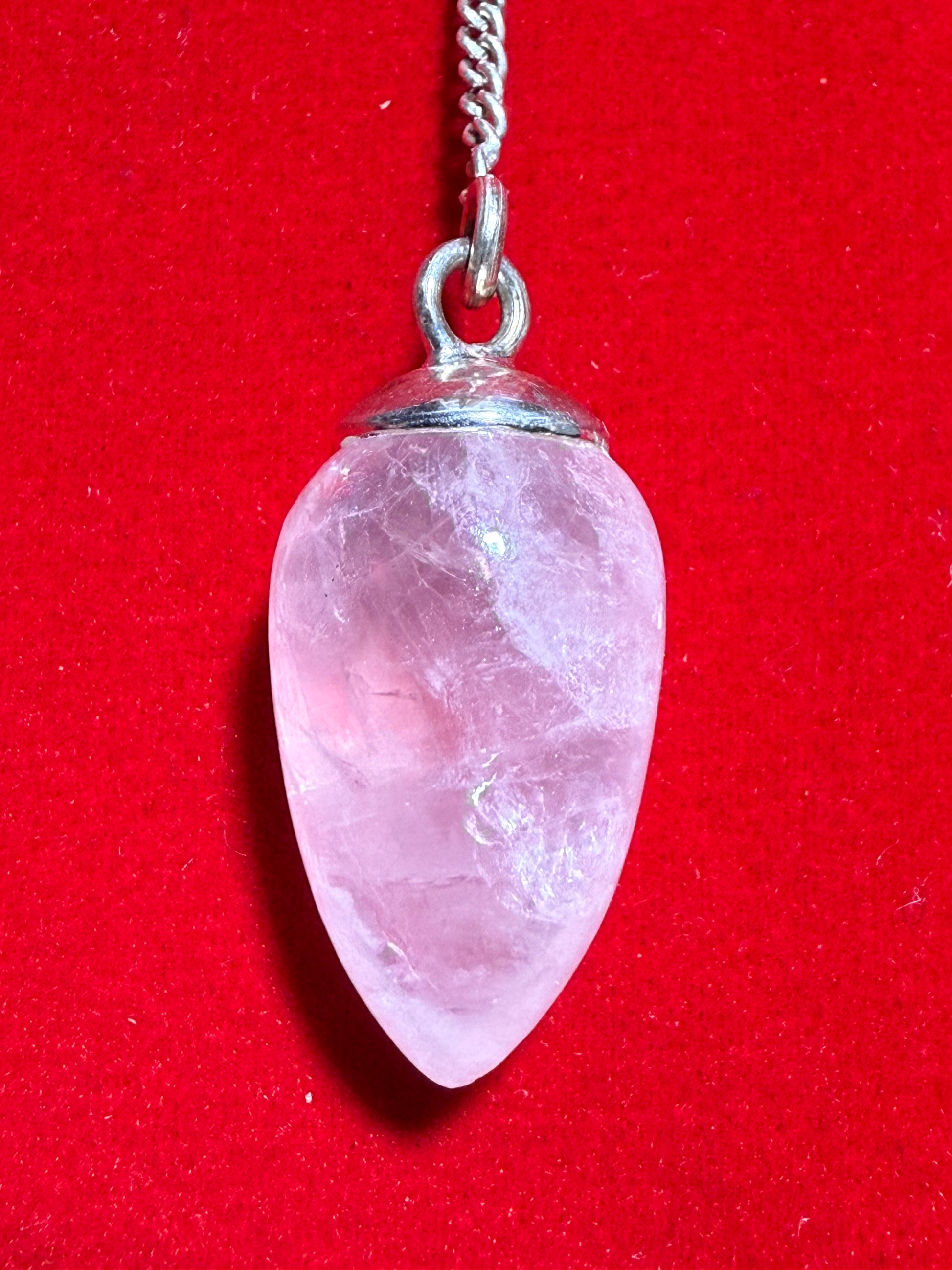 Rose Quartz Sterling Silver Pendulum – gentle divination tool featuring pink rose quartz crystal symbolizing love and emotional healing.
