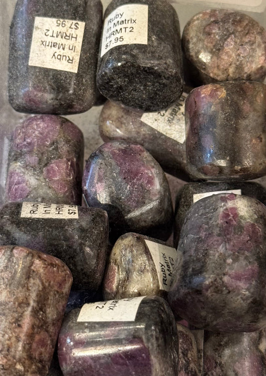 Ruby Crystal in Matrix Tumbled – polished ruby crystals embedded in matrix rock, perfect for energetic and bold jewelry.
