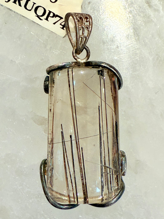 Rutilated Quartz Sterling Silver Pendant – striking crystal jewelry featuring golden needle-like rutile inclusions symbolizing clarity and energy.
