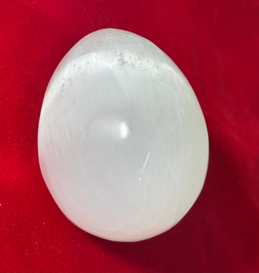 Selenite Egg Shaped Crystal Tumbled – smooth polished selenite egg-shaped crystal, perfect for cleansing and healing.
