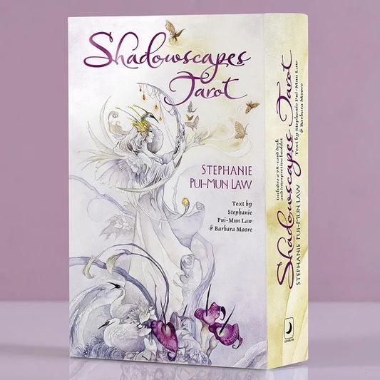 Shadowscapes Tarot by Stephanie Pui-Mun Law & Barbara Moore – a 78-card deck featuring intricate watercolor illustrations blending Asian, Celtic, and fantasy themes, accompanied by a guidebook for intuitive readings.
