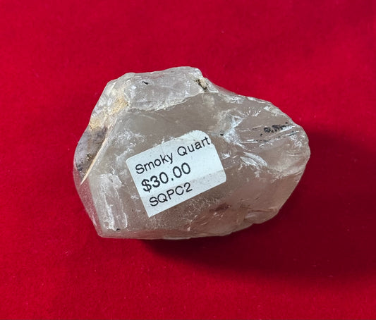 Smoky Quartz Crystal – natural smoky quartz known for grounding and protective properties.
