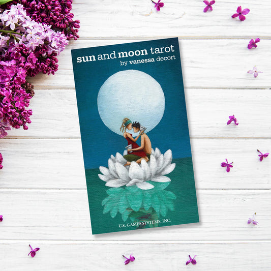 Sun and Moon Tarot in a Tin by Vanessa Decort – a portable, illustrated tarot deck housed in a decorative tin for intuitive readings on the go.
