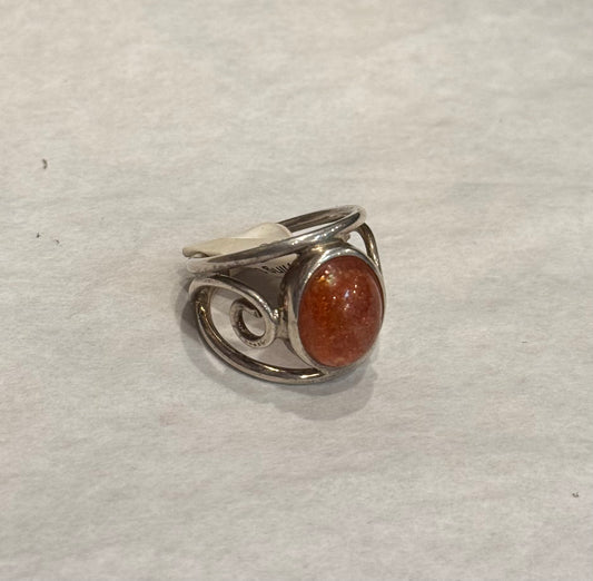Sunstone Sterling Silver Ring size 5 – radiant orange crystal jewelry symbolizing vitality, energy, and joy.
