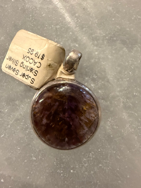 Super Seven Multigem Sterling Silver Pendant – powerful blend of seven crystals promoting spiritual growth and healing.