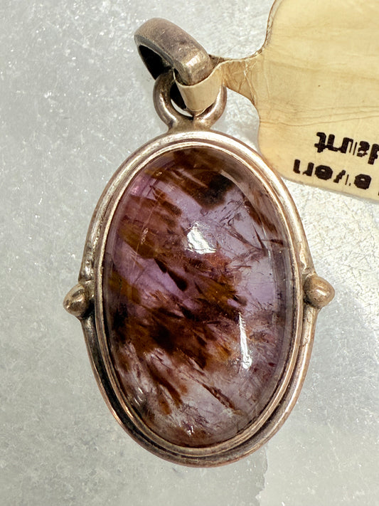 Super Seven Sterling Silver Pendant – powerful crystal blend for spiritual growth, healing, and energetic alignment.