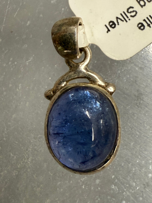 Tanzanite Sterling Silver Pendant – vibrant blue-violet crystal jewelry known for spiritual insight, transformation, and calming energy.
