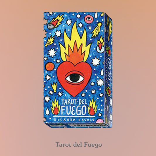 Tarot del Fuego by Ricardo Cavolo – 78-card deck featuring bold, fiery artwork with omnipresent eyes of fire and rosy-cheeked figures, inspired by the Tarot de Marseille, accompanied by a multilingual instruction booklet.
