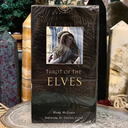 Tarot of the Elves by Mark McElroy & Davide Corsi – 78-card deck featuring fantasy art and elven lore in a Rider-Waite-Smith style.
