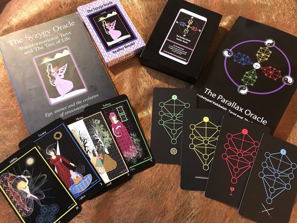 The Syzygy Oracle by Heather Mendel – Kabbalistic Tarot deck exploring ego, essence, and consciousness evolution.
